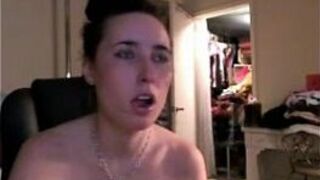 Naked cam chick sits on her big purple dildo - porn video